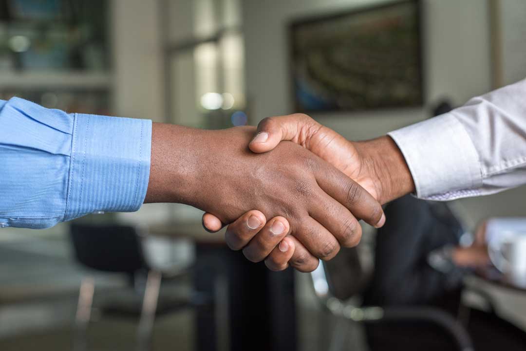 A handshake to indicate a good deal in succesful selling
